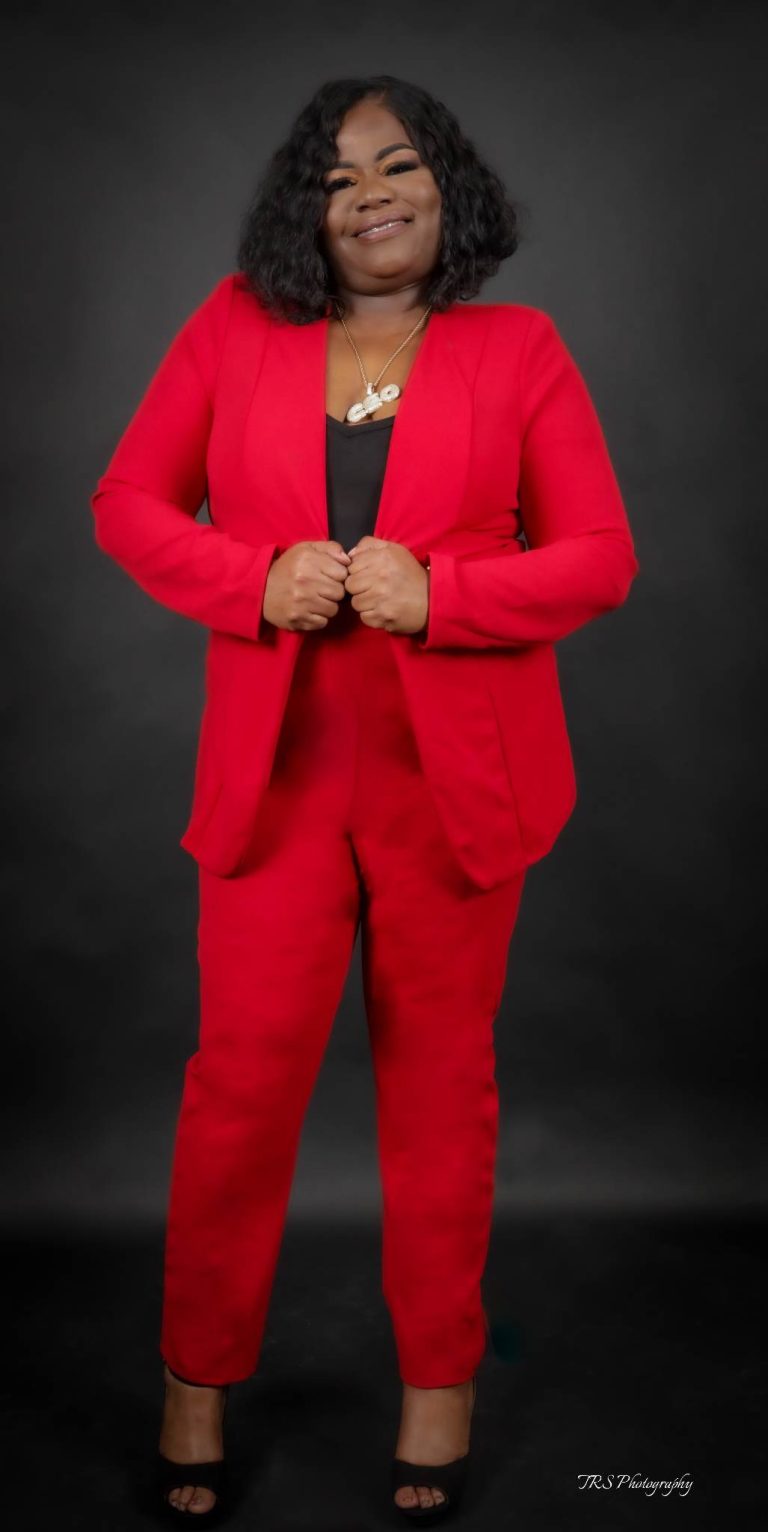 redsuitstanding 768x1532